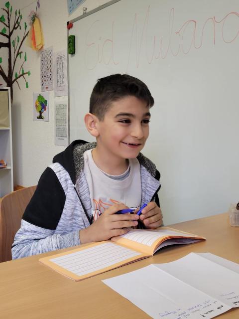 ein Junge bei der kostenlosen Nachhilfe