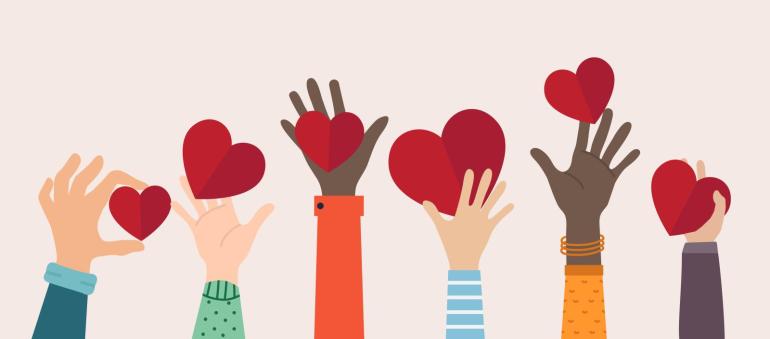 Kinder halten Herzen hoch und sagen DANKE